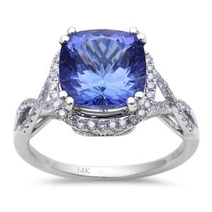 white gold tanzanite and diamond ring